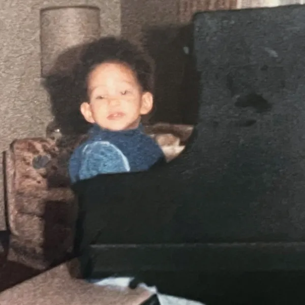 Young Gabrielle Faulkner at the piano.